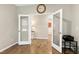 Office with French doors showcases hardwood floors at 823 Atticus Way, Durham, NC 27703