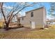 View of the backyard and wood deck with access to the home through sliding glass doors at 8341 Wynewood Ct, Raleigh, NC 27616