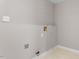 Unfinished laundry room with connections for washer and dryer at 8341 Wynewood Ct, Raleigh, NC 27616