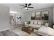 Cozy living room with a comfortable sectional sofa and an adjacent dining area at 8341 Wynewood Ct, Raleigh, NC 27616