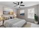 Relaxing main bedroom with neutral tones, a comfortable bed, and stylish decor at 8341 Wynewood Ct, Raleigh, NC 27616