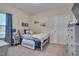 Comfortable bedroom with twin bed, carpet and natural light from a window at 84 Nonabell Ln, Four Oaks, NC 27524
