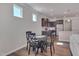 Bright dining area with wood floors, recessed lighting, and a view of the kitchen at 84 Nonabell Ln, Four Oaks, NC 27524