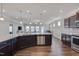 Spacious kitchen featuring an island, stainless steel appliances, and hardwood floors at 84 Nonabell Ln, Four Oaks, NC 27524