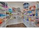 Well-organized pantry with abundant white wire shelving for storing groceries and household items at 84 Nonabell Ln, Four Oaks, NC 27524