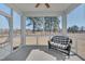 Enjoy the outdoors in the comfort of screened porch with comfortable seating at 84 Nonabell Ln, Four Oaks, NC 27524