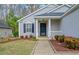 Charming home with a landscaped front yard and inviting entrance at 912 Homestead Park Dr, Apex, NC 27502