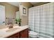 Bathroom with a modern vanity, framed mirror, and a shower/tub combination at 920 Chapanoke Rd, Raleigh, NC 27603