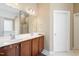 Bathroom features dual sinks, vanity with storage, and a shower at 94 Fawn Hill Ct, Garner, NC 27529