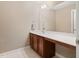 Bathroom featuring light tile flooring, neutral paint, and wooden vanity at 94 Fawn Hill Ct, Garner, NC 27529