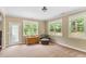 Bright bedroom with three windows, creating a cheerful and inviting space at 94 Fawn Hill Ct, Garner, NC 27529