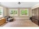 Spacious bedroom with two large windows and ample closet space for storage at 94 Fawn Hill Ct, Garner, NC 27529