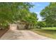Charming two-story home with a manicured lawn, mature trees, and a welcoming front porch at 94 Fawn Hill Ct, Garner, NC 27529