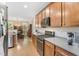 Open-concept kitchen with stainless steel appliances and direct access to the dining area at 94 Fawn Hill Ct, Garner, NC 27529