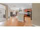 Spacious kitchen featuring stainless steel appliances, warm wood cabinets, and an attached dining area at 94 Fawn Hill Ct, Garner, NC 27529