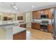 Well-equipped kitchen featuring stainless steel appliances and beautiful wood cabinetry at 94 Fawn Hill Ct, Garner, NC 27529