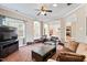 Spacious living room with arched doorways and a comfortable seating area at 94 Fawn Hill Ct, Garner, NC 27529