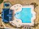 Aerial view of a community pool with ample seating, offering a refreshing recreational amenity at 94 Fawn Hill Ct, Garner, NC 27529