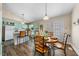 The dining area features natural light and a round table ready for meals at 1008 Torredge Rd, Durham, NC 27712