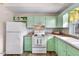 Bright kitchen area with colorful countertops and cabinetry at 1008 Torredge Rd, Durham, NC 27712
