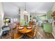 Open living space offers a living room, dining area, and bright kitchen with barstool seating at 1008 Torredge Rd, Durham, NC 27712
