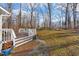 Deck with brick walkway, great for outdoor entertaining or relaxing in a beautiful outdoor setting at 1008 Torredge Rd, Durham, NC 27712