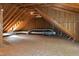 Open attic space with exposed rafters and ductwork, offering potential for storage or customization at 102 Legault Dr, Cary, NC 27513