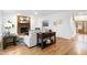 Stylish living room with hardwood floors and a brick fireplace at 102 Legault Dr, Cary, NC 27513