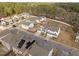 Scenic aerial showcasing suburban homes with varied exterior finishes and well-manicured lawns at 1026 Janiskee Rd, Durham, NC 27703