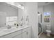 Bathroom features a double vanity, shower and toilet at 1026 Janiskee Rd, Durham, NC 27703