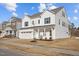 Charming two-story home with a two-car garage, well-kept lawn, and inviting curb appeal at 1026 Janiskee Rd, Durham, NC 27703
