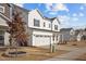 Charming two-story home showcasing the front exterior, two-car garage, and well-manicured lawn at 1026 Janiskee Rd, Durham, NC 27703
