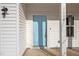 Welcoming entryway featuring a bright blue front door at 1026 Janiskee Rd, Durham, NC 27703