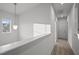 Upstairs hallway featuring neutral walls and carpet at 1026 Janiskee Rd, Durham, NC 27703