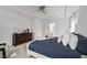 This primary suite includes a tray ceiling, dresser, and an ensuite bath at 1026 Janiskee Rd, Durham, NC 27703
