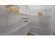 Walk-in pantry features metal shelving for maximum storage of food and kitchen supplies at 1026 Janiskee Rd, Durham, NC 27703