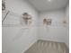 Walk-in closet features ample shelving and organization space at 1026 Janiskee Rd, Durham, NC 27703