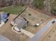 Aerial view of home with a large, fenced backyard, showcasing the property's spaciousness and privacy at 1028 Allaire Dr, Raleigh, NC 27603