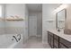 Bathroom with soaking tub, double vanity and lots of natural light at 1028 Allaire Dr, Raleigh, NC 27603