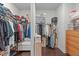 Walk-in closet with lots of storage and organization at 1028 Allaire Dr, Raleigh, NC 27603