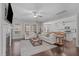 Inviting living room with fireplace, plush seating, and an open layout that connects to the kitchen and dining areas at 1028 Allaire Dr, Raleigh, NC 27603