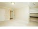 Carpeted bedroom with a built-in desk, and ample natural light at 104 E Laramie Dr, Mebane, NC 27302