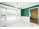 Bright breakfast nook featuring a bay window with views of the backyard and easy access to the kitchen at 104 E Laramie Dr, Mebane, NC 27302
