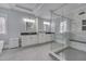 Modern bathroom with a glass-enclosed shower and double vanity offers a luxurious and spacious design at 108 Springfield Pl, Hillsborough, NC 27278