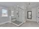 Elegant bathroom with a glass-enclosed shower with a seat and decorative tile, creating a spa-like retreat at 108 Springfield Pl, Hillsborough, NC 27278