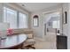 Cozy bedroom nook features a round table with chair and view to bedroom at 108 Springfield Pl, Hillsborough, NC 27278