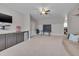 Large game room with ping pong table, wet bar and TV at 108 Springfield Pl, Hillsborough, NC 27278