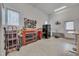 Well-lit garage with tool storage and work area, providing space for projects and organization at 108 Springfield Pl, Hillsborough, NC 27278