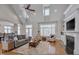 Bright living room with hardwood floors, fireplace and high vaulted ceilings at 108 Springfield Pl, Hillsborough, NC 27278