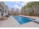 Sparkling in-ground pool with surrounding patio and lounge chairs, perfect for outdoor relaxation and entertainment at 108 Springfield Pl, Hillsborough, NC 27278